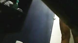 A girl washes herself in the shower, not knowing there’s a camera