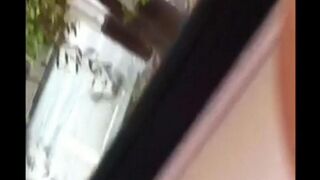 The guy masturbates in the street, showing his balls to everyone