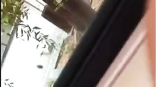 The guy masturbates in the street, showing his balls to everyone