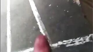 The guy masturbates in the street, showing his balls to everyone