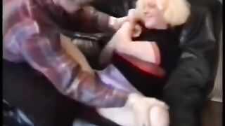 A chick is having fun with her boyfriend on a couch