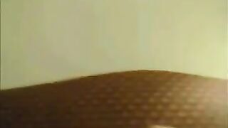 Latina with big tits shakes them on the webcam