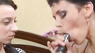 A mom teaches her Russian daughter how to suck cock using a strap-on