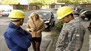 Girl in black pantyhose gets a cock sucked on the set of porn