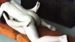 A young married couple enjoy passionate sex right at home