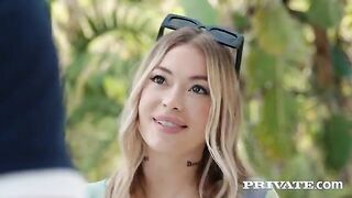 A young girl is having fun with two guys at the pool