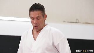 A girl is having sex in an uncomfortable position with a coach