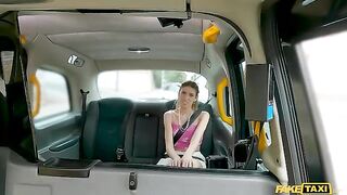 A car girl is screaming with pleasure from a stick in the car