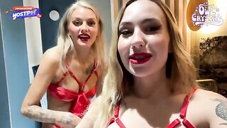 Two girls are having fun with a guy and another girl