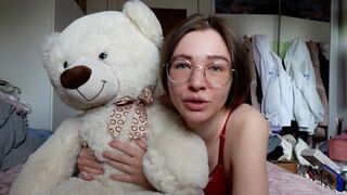 A girl has fun with her best friend, a cute teddy bear