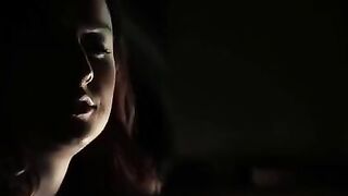 An investigator takes a break from the case to engage in intimate acts with her girlfriend