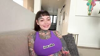 A tattooed girl with big boobs gets her pussy filled with cum