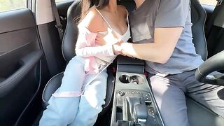 The girl is having fun with her teacher in the car