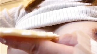 A Japanese woman masturbates with her huge boobs, showcasing a remarkable technique