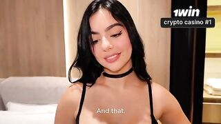 A girl with a great figure is playing with a towel on her body
