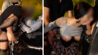 A woman has sex with three guys in the parking lot