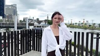 A signal of distress from a beautiful girl in a bikini