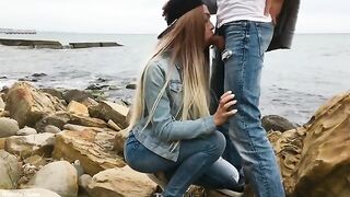 A hot blonde girl skillfully fucks with her mouth outdoors